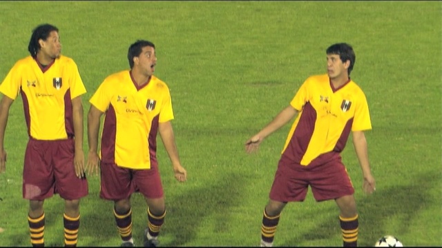 Video Reference: player, football player, clothing, yellow, sport venue, team, team sport, soccer player, sports, games, Person
