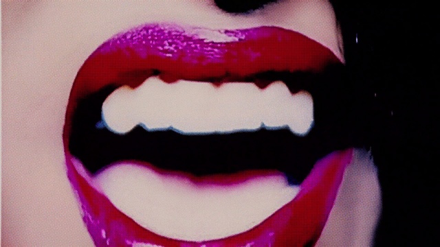 Video Reference: Lip, Facial expression, Mouth, Tooth, Purple, Smile, Pink, Organ, Close-up, Fictional character