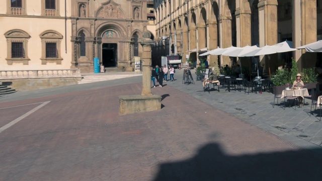 Video Reference: Town, Street, Building, City, Road surface, Tourism, Asphalt, Pedestrian, Architecture, Road