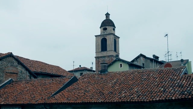 Video Reference: Roof, Steeple, Building, Sky, Architecture, Church, Tower, Bell tower, Medieval architecture, Place of worship, Person