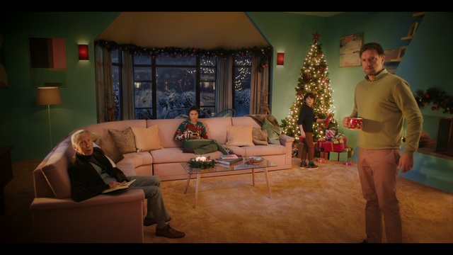 Video Reference: Room, Living room, Couch, Tree, Drama, Fun, Scene, Interior design, Furniture, Theatrical scenery, Person