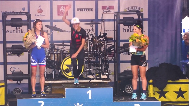 Video Reference: Performance, Stage equipment, Physical fitness, Recreation, Room, Event, Competition, Stage, Vehicle, Sports, Person
