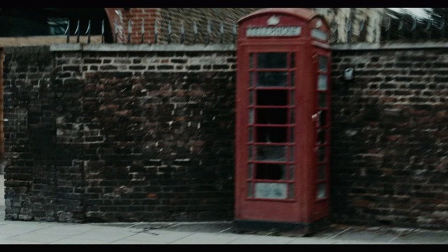Video Reference: Telephone booth, Brickwork, Red, Wall, Payphone, Brick, Urban area, Facade, Technology, Outdoor structure, Building, Outdoor, Street, Front, Sidewalk, Sitting, Cat, Man, Fire, House, Door, Stone, Standing, Parked, Black, Woman, Large, Holding, Sign, Hydrant, Riding, Young, Jumping, Trick, City, Tall, Umbrella, White, Doing, Playing, Ball, Window