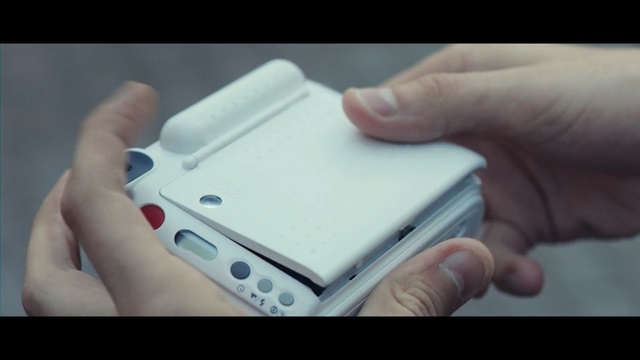 Video Reference: Gadget, Electronic device, Technology, Hand, Nail, Finger, Electronics, Nintendo ds accessories, Gesture