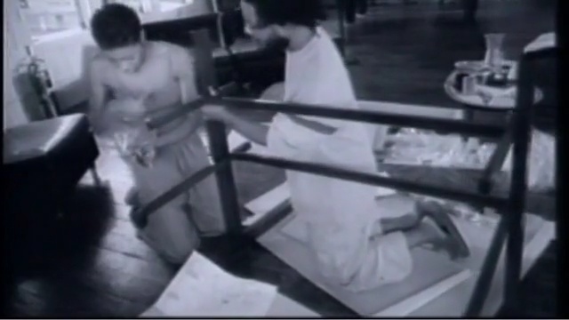 Video Reference: black and white, mode of transport, structure, monochrome photography, muscle, monochrome, girl, sport venue, Person