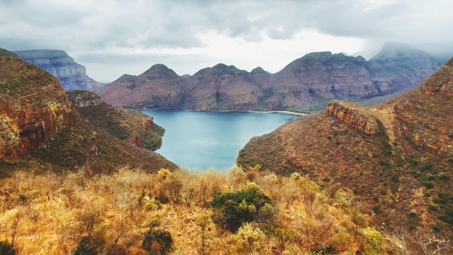 Video Reference: Natural landscape, Body of water, Nature, Mountainous landforms, Mountain, Lake, Wilderness, Highland, Sky, Reservoir