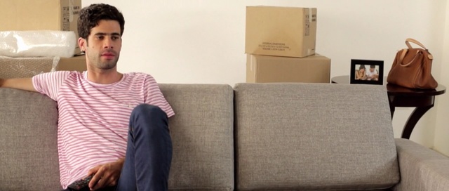 Video Reference: furniture, shoulder, couch, sitting, textile, product, flooring, Person