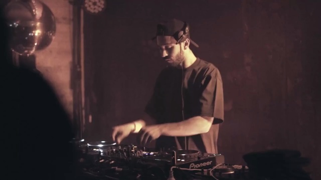 Video Reference: darkness, disc jockey, audio, musician, night, music, event, musical instrument accessory, performance art, musical instrument