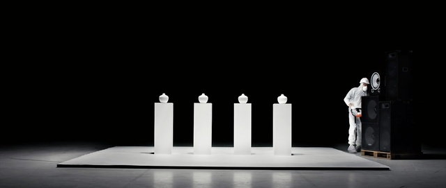 Video Reference: black and white, monochrome, monochrome photography, darkness, stage, table, Person