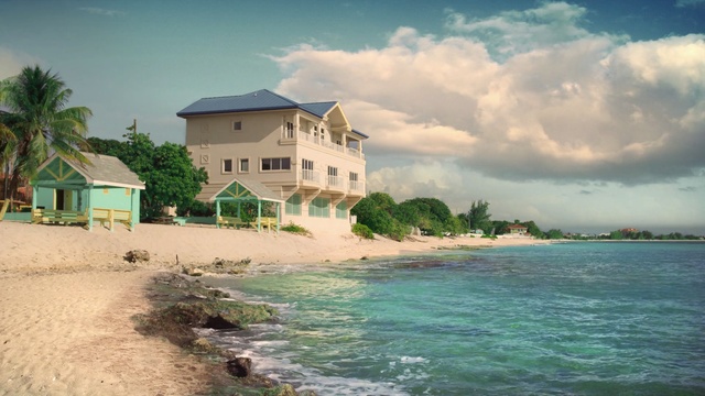 Video Reference: villa, water, landscape, sea, ocean, vacation, beach, coast, sky, travel, resort, island, summer, shore, tourism, tree, lake, building