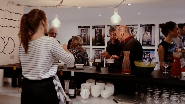 Video Reference: drink, distilled beverage, restaurant, interior design, event, liqueur, Person