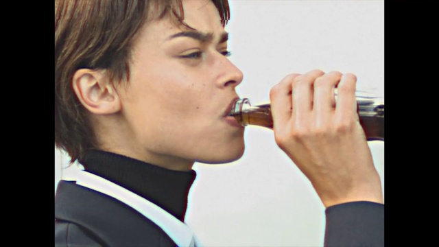 Video Reference: Nose, Chin, Neck, Drinking, Mouth, Eating, Junk food, Ear, Jaw, Gesture