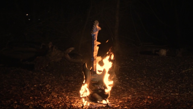 Video Reference: Fire, Flame, Campfire, Heat, Bonfire, Night, Event, Darkness, Outdoor, Nature, Dark, Building, Hydrant, Fireplace, Coming, Street, Smoke, Water, Front, Man, Standing, Riding, Field, Cooking