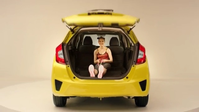 Video Reference: car, motor vehicle, vehicle, yellow, vehicle door, mode of transport, automotive design, honda, city car, automotive exterior