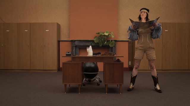 Video Reference: furniture, flooring, desk, table, wood, floor, Person