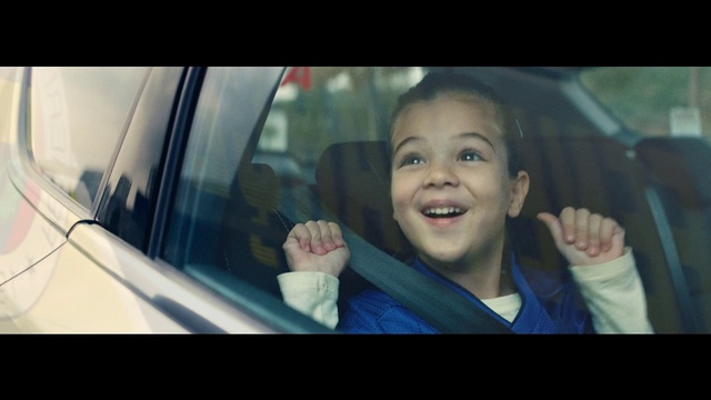 Video Reference: Vehicle door, Face, Facial expression, Head, Driving, Snapshot, Mode of transport, Car seat, Smile, Family car