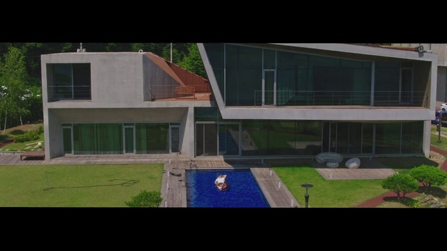 Video Reference: Property, House, Architecture, Residential area, Home, Building, Real estate, Grass, Facade, Roof