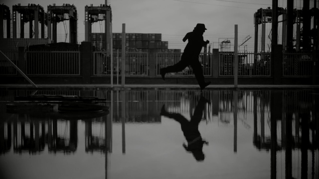 Video Reference: reflection, water, black, photograph, black and white, monochrome photography, urban area, darkness, photography, metropolis, Person