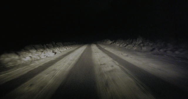 Video Reference: Black, Darkness, Snow, Road, Sky, Atmospheric phenomenon, Light, Night, Winter, Tree