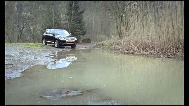 Video Reference: car, water, motor vehicle, vehicle, off roading, off road vehicle, water resources, automotive exterior, road, river
