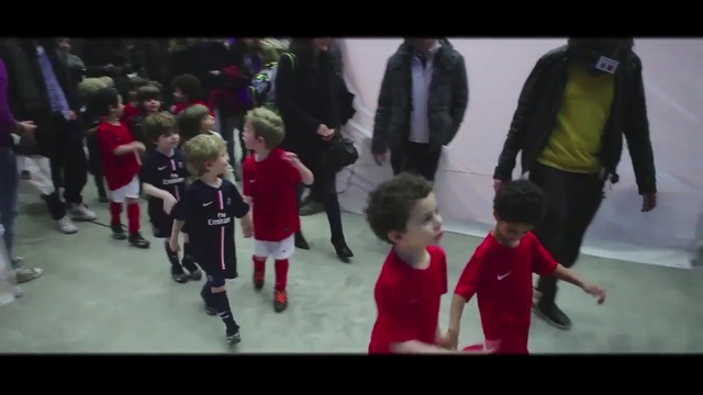 Video Reference: Social group, People, Red, Team, Youth, Footwear, Competition event, Tournament, Crowd, Fun