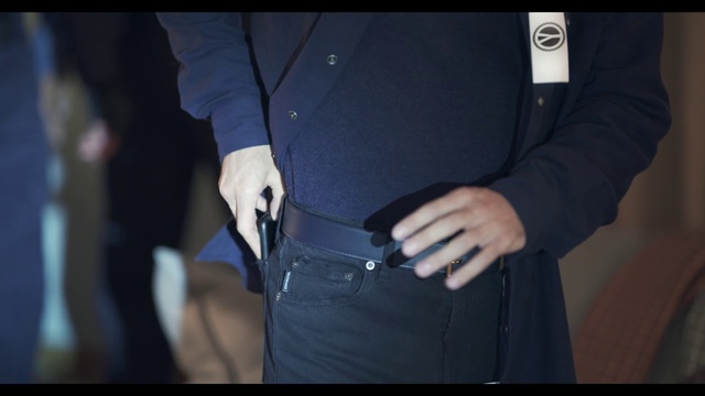Video Reference: Waist, Outerwear, Hand, Abdomen, Gesture, Black hair, Trunk, Sleeve, Jacket, Jeans