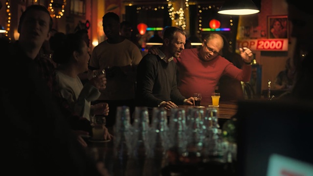 Video Reference: night, event, bar, fun, drink, darkness, lighting, crowd, pub, restaurant, Person