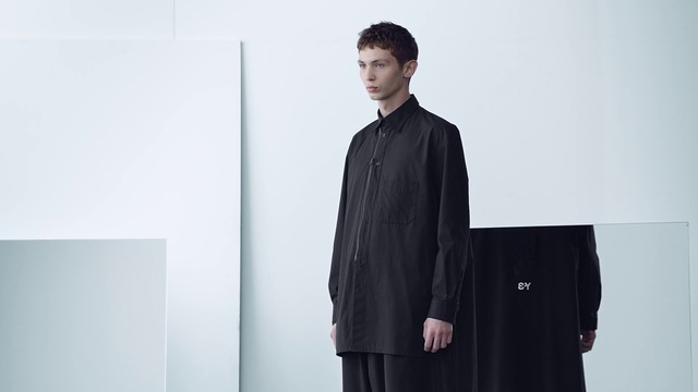 Video Reference: Clothing, Fashion, Outerwear, Formal wear, Neck, Standing, Suit, Collar, Sleeve, Overcoat