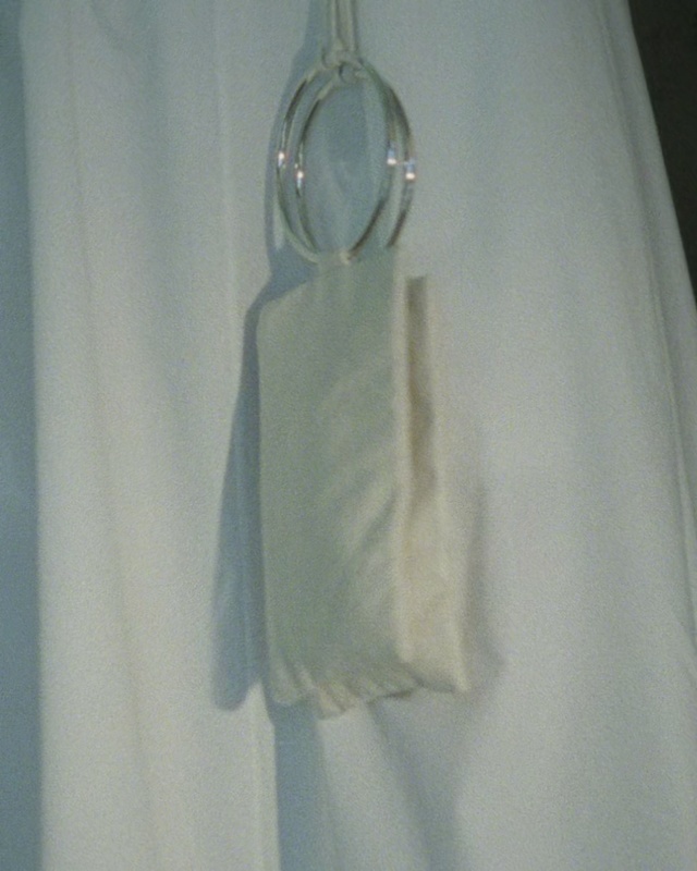 Video Reference: White, Clothes hanger, Outerwear, Linens, Dress