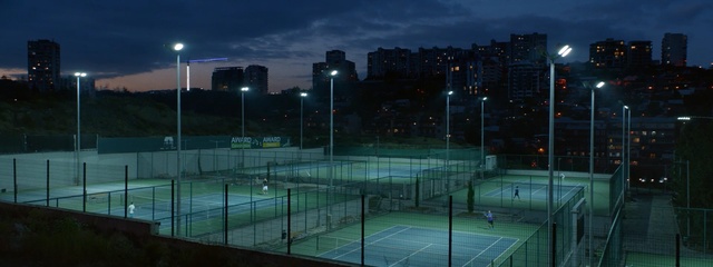 Video Reference: Sport venue, Tennis court, Sky, Night, Lighting, Architecture, Evening, Street light, Tennis, Stadium