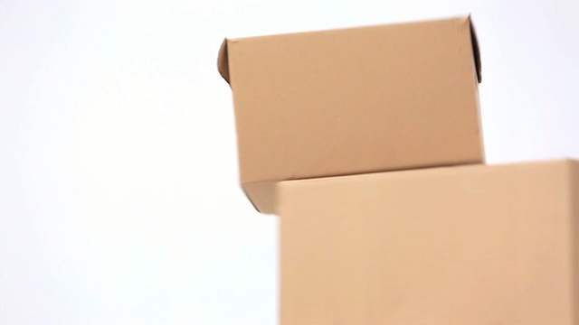 Video Reference: Box, Beige, Shipping box, Cardboard, Material property, Rectangle, Paper product, Paper, Packaging and labeling, Carton