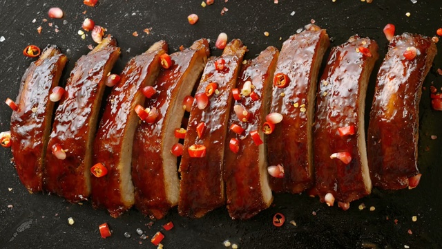 Video Reference: meat, roasting, grilling, barbecue, pork ribs, spare ribs, grillades, beef, animal source foods, bratwurst, Person