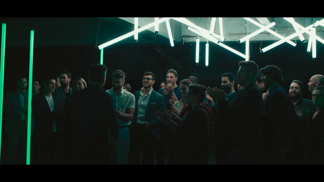 Video Reference: Green, Photograph, Crowd, Event, Design, Darkness, Photography, Fun, Font, Audience, Person