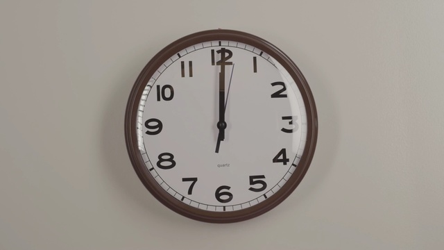 Video Reference: clock, home accessories, wall clock, font, circle, number, Person