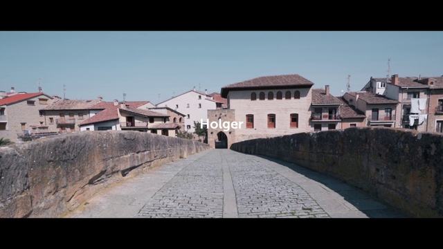 Video Reference: Town, Historic site, Wall, Landmark, Human settlement, Architecture, Building, Neighbourhood, Residential area, Street