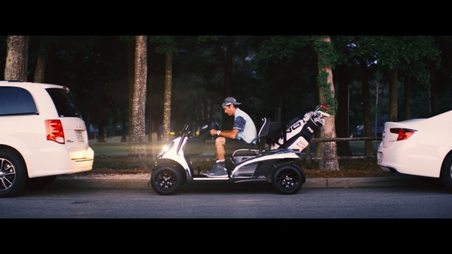 Video Reference: car, motor vehicle, vehicle, mode of transport, automotive design, automotive wheel system, wheel, golf cart, scooter, automotive exterior
