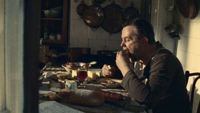 Video Reference: man, dinner, kitchen, food, low light, Person