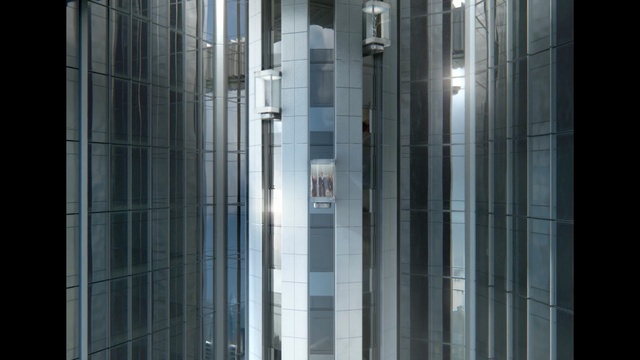 Video Reference: Architecture, Glass, Reflection, Building, Metropolitan area, Line, Transparent material, Window, Facade, Tower block, Indoor, Door, Tiled, Shower, Large, Stall, Standing, Public, Black, Sitting, Walking, Tall, White, Restroom, Clear, Group, Room, Sink, Street, Rain, Skyscraper, Bathroom, City