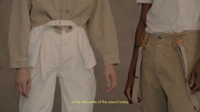 Video Reference: White, Clothing, Khaki, Outerwear, Beige, Trench coat, Sleeve, Trousers