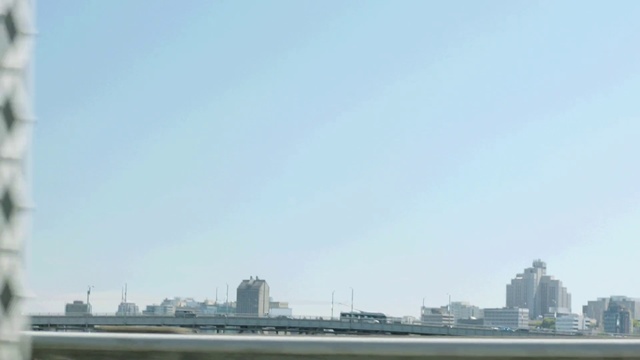 Video Reference: Metropolitan area, Daytime, Skyline, City, Cityscape, Skyscraper, Sky, Urban area, Atmospheric phenomenon, Metropolis