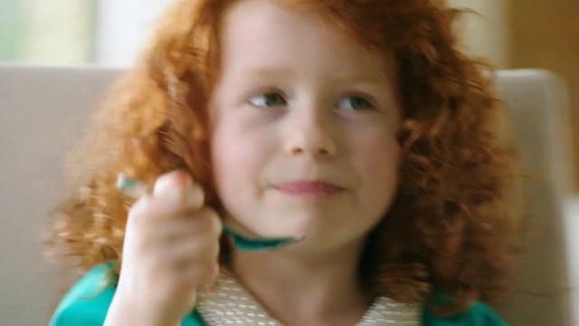 Video Reference: Face, Hair, Child, Nose, Cheek, Lip, Skin, Tooth, Chin, Hairstyle, Person