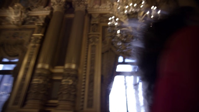 Video Reference: Light, Architecture, Place of worship, Column, Basilica, Building, Church, Religious institute, Cathedral, Night, Person, Indoor, Table, Sitting, Front, Glass, Close, Large, Organ, Room, Holding, Woman, Counter, Man, Computer, Clock, Kitchen, Mirror, Red, Vase, Standing, Tall, White