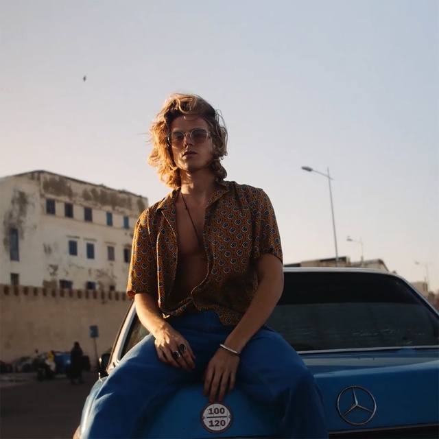 Video Reference: Luxury vehicle, Vehicle, Car, Sitting, Photography, Travel, Electric blue, City car, Person