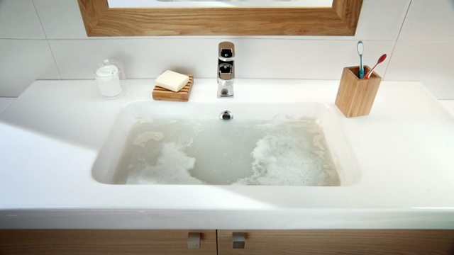 Video Reference: bathtub, sink, room, bathroom, tap, plumbing fixture, bathroom sink, floor, interior design, jacuzzi, Person