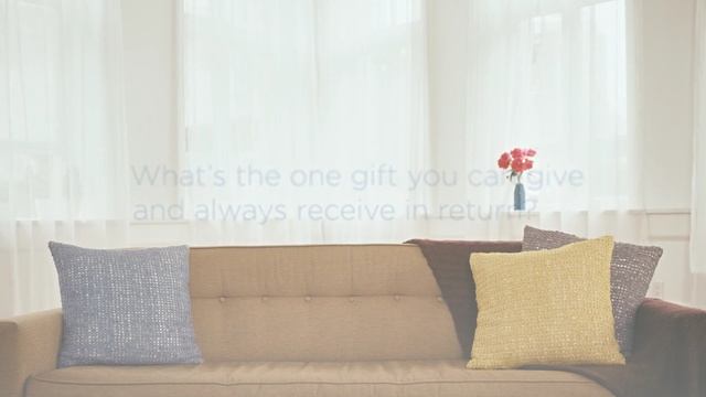 Video Reference: property, furniture, room, wall, interior design, couch, cushion, product, living room, angle, Person