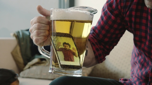 Video Reference: Beer glass, Alcohol, Drink, Beer, Alcoholic beverage, Hand, Lager, Pint glass, Beer stein, Drinkware, Person