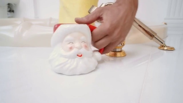 Video Reference: Santa claus, Head, Fictional character, Hand, Figurine