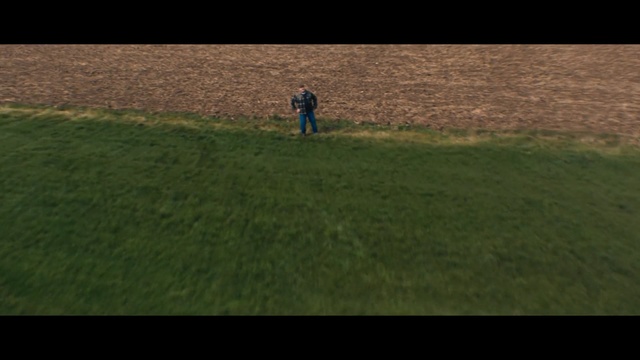 Video Reference: Grassland, Lawn, Grass, Plain, Green, Natural environment, Pasture, Field, Land lot, Prairie, Person