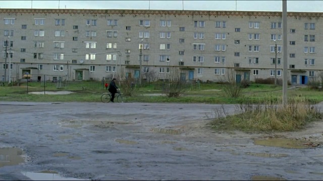 Video Reference: residential area, urban area, neighbourhood, property, town, suburb, land lot, sky, water, house, Person