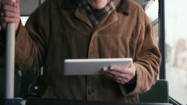 Video Reference: Gadget, Electronic device, Snapshot, Technology, Arm, Hand, Sitting, Jacket, Display device, Photography